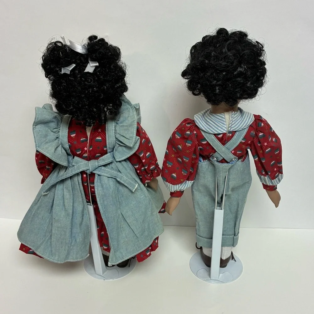Delton Product Corp. Porcelain Brown Boy Girl Dolls Stands Matching Outfits